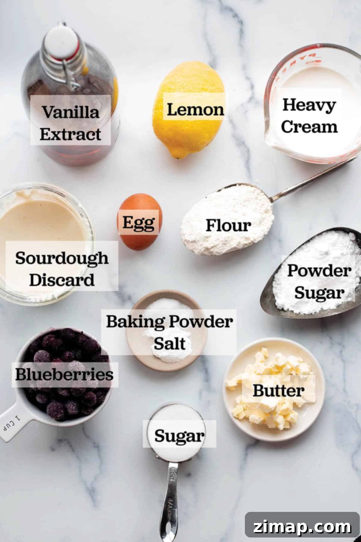 Προζυμένια Μύρτιλα Σκόουνς 3 Ingredients in measuring cups and bowls to make blueberry scones.