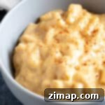 Σιγομαγειρεμένο Τυρόμακαρο 7 Ένα μπολ με μακαρόνια με τυρί από αργό μαγειρευτήρα.