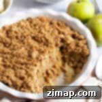 Εύκολο Κραμπλ Μήλου με Άρωμα Κανέλας 6 Εύκολο μήλο κράμπλ κανέλας σε ταψί για πίτα.
