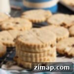 Εύκολη Παραδοσιακή Συνταγή για Κουλουράκια Ψυχής 6 Μια στοίβα από ψυχούδια σε μεταλλική σχάρα.