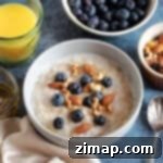 Εύκολη Συνταγή Πόριτζ σε Αργή Κατσαρόλα 7 Ένα μπολ με χυλό αργής μαγειρικής με μύρτιλα.
