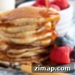 Εύκολες Βρετανικές Τηγανίτες Βουτυρόγαλου 7 Μια στοίβα τηγανίτες με βουτυρόγαλα.