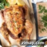 Το πιο εύκολο Ολόκληρο Κοτόπουλο στην Φριτέζα Αέρος 9 Ολόκληρο κοτόπουλο στη φριτέζα αέρος με βότανα και λεμόνι.