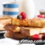 Πανεύκολες Αυγόφετες Στικς στην Φριτέζα Αέρος 11 Τηγανητό ψωμί σε φριτέζα αέρος περιχυμένο με σιρόπι σφενδάμου.