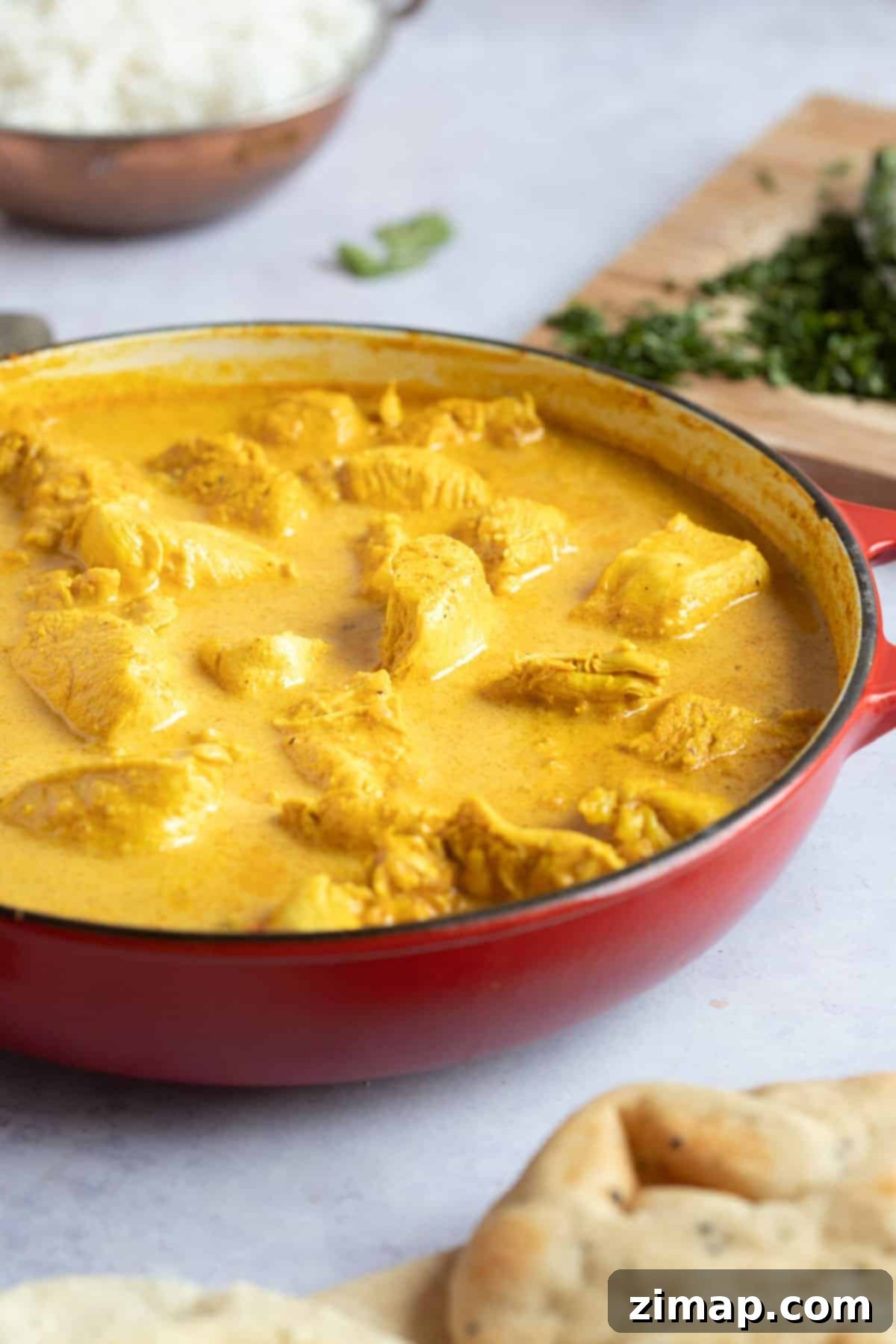 Εύκολο Κοτόπουλο Κόρμα 11 Korma κοτόπουλο με ψιλοκομμένο κόλιανδρο.