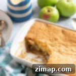 Εύκολη Πουτίγκα της Εύας 15 Eve's pudding σε λευκό ταψί.