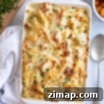 Τυρένια Μακαρονάδα Φούρνου με Περισσευούμενη Γαλοπούλα 9 Παστίτσιο με γαλοπούλα που περίσσεψε σε ένα λευκό ταψί.