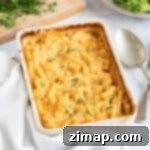 Εύκολα Μακαρόνια με Τυρί στο Air Fryer 8 Air fryer macaroni cheese in a baking dish.