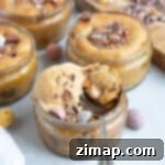 Αυγο-γλυκάκια Αέρος 9 Air fryer mini egg dessert pots with a scoop of ice cream on top.