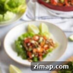 Εύκολη Συνταγή για Κινέζικα Τυλιχτά Μαρούλια με Χοιρινό 8 Χοιρινό yuk sung σε πιάτο.