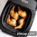 Αερόφρυτα Τραγανά Μπούτια Κοτόπουλου 8 Air fryer chicken legs in a Ninja Foodi air fryer