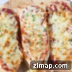 Πίτσα Μπαγκέτας στη Φριτέζα Αέρος 9 Τρεις φέτες πίτσας σε ψωμί μπαγκέτας από φριτέζα αέρος.