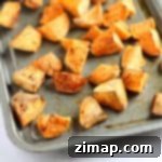 Εύκολες Ψητές Γλυκοπατάτες με Καπνιστή Πάπρικα 5 Ένα ταψί με ψητές γλυκοπατάτες