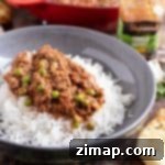 Εύκολο Κάρυ Μοσχαρίσιου Κιμά 7 Κάρι Keema Matar σε στρώμα ρυζιού basmati.