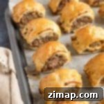 Σπιτική Λουκανικόπιτα Σφολιάτας 5 Λουκανικόπιτες σφολιάτας σε ταψί.