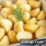 Τραγανές Πατάτες Φούρνου με Πολέντα 7 Τραγανές πατάτες φούρνου με πολέντα σε ταψί.