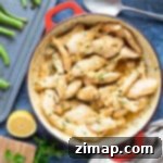Κοτόπουλο με Βούτυρο Σκόρδου 6 Κοτόπουλο με σκόρδο και βούτυρο σε τηγάνι.