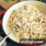 Βελούδινα Σπαγγέτι Μπουρσέν 6 Ένα τηγάνι με ζυμαρικά σε κρεμώδη σάλτσα Boursin.