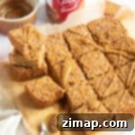 Συνταγή για Μπάρες Βρώμης Λότους Μπίσκοφ 7 Biscoff flapjacks κομμένα σε τετράγωνα.