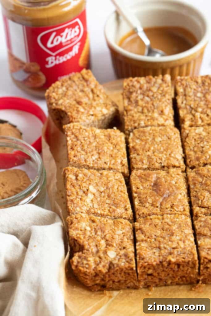 Συνταγή για Μπάρες Βρώμης Λότους Μπίσκοφ 6 Biscoff flapjack κομμένο σε τετράγωνα.