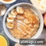 Κρέμα Βρώμης Μπισκόφ 6 Biscoff porridge topped with banana slices.
